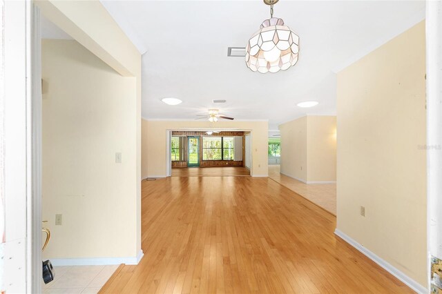 12180 Maple St, Dunnellon, FL 34432 - hall featuring light wood-style flooring and baseboards