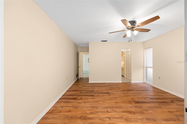 12180 Maple St, Dunnellon, FL 34432 - unfurnished room featuring light wood-style flooring and ceiling fan