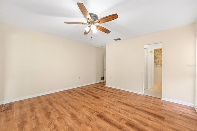 12180 Maple St, Dunnellon, FL 34432 - empty room featuring ceiling fan and light wood finished floors