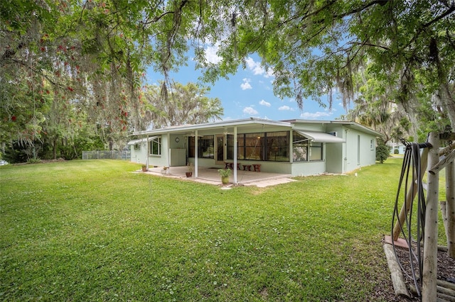 12180 Maple St, Dunnellon, FL 34432 - back of property featuring a patio
