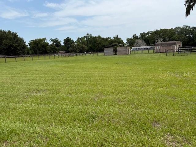 6020 NW 2nd Ave, Ocala, FL 34475 - view of yard featuring an outdoor structure and a view of countryside