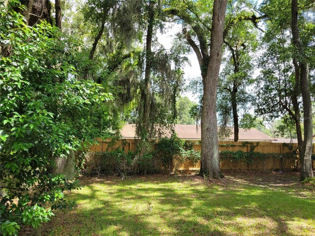 707/709 NE 26th St, Ocala, FL 34470 - view of yard with fence