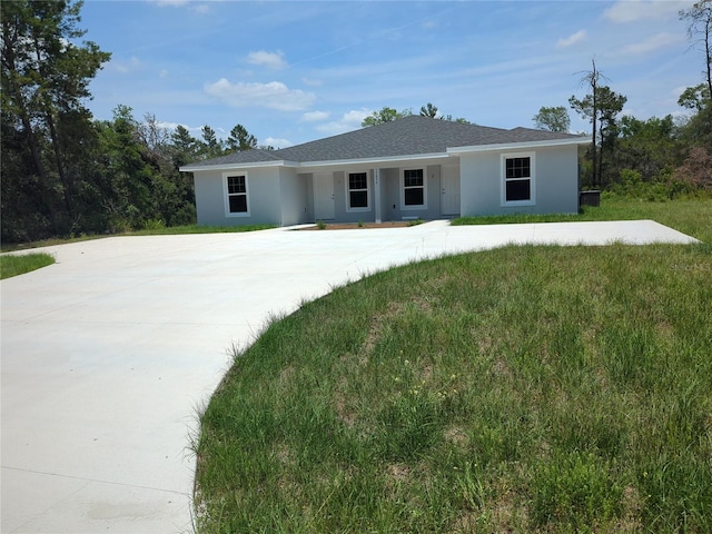 15099 SW 29th Terrace Rd, Ocala, FL 34473 - ranch-style house featuring stucco siding and concrete driveway
