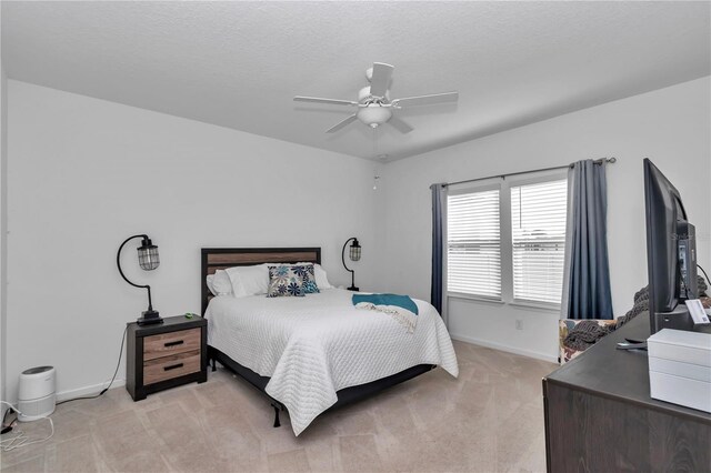 9312 SW 58th Cir, Ocala, FL 34476 - bedroom with light colored carpet, baseboards, and ceiling fan