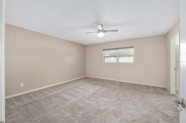 8645 SW 94th Ln Unit E, Ocala, FL 34481 - unfurnished room featuring a textured ceiling, ceiling fan, baseboards, and carpet floors