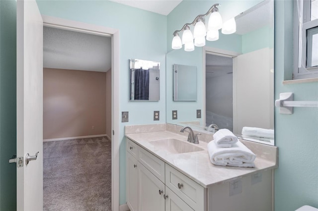 8645 SW 94th Ln Unit E, Ocala, FL 34481 - bathroom with vanity and baseboards