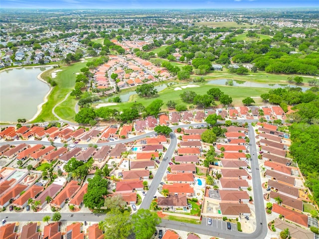 916 Cancun Ct, Lady Lake, FL 32159 - bird's eye view featuring a water view, view of golf course, and a residential view