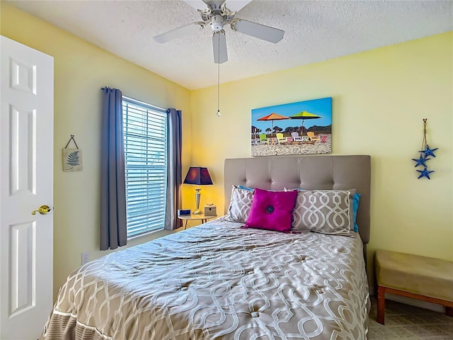 916 Cancun Ct, Lady Lake, FL 32159 - bedroom with ceiling fan and a textured ceiling