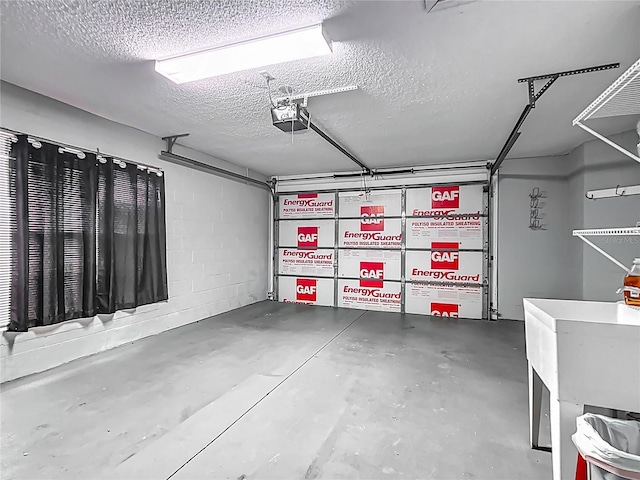 916 Cancun Ct, Lady Lake, FL 32159 - garage with concrete block wall and a garage door opener