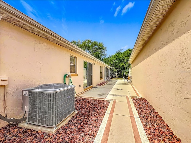 916 Cancun Ct, Lady Lake, FL 32159 - view of patio with central AC unit