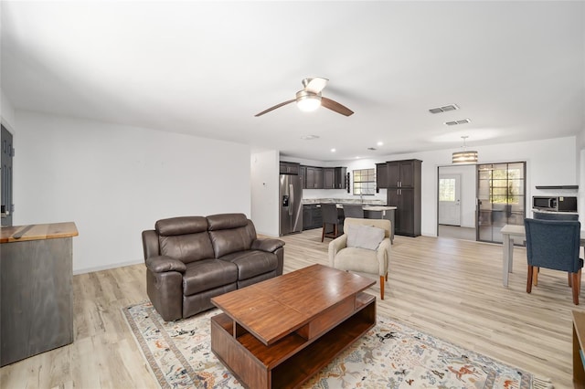 6549 NW 65th Pl, Ocala, FL 34482 - living room with visible vents, light wood-style floors, ceiling fan, and recessed lighting