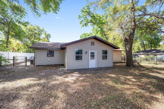 6549 NW 65th Pl, Ocala, FL 34482 - rear view of property featuring fence