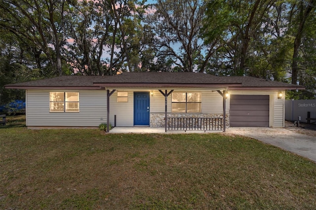 6549 NW 65th Pl, Ocala, FL 34482 - ranch-style home featuring a lawn, a garage, and concrete driveway