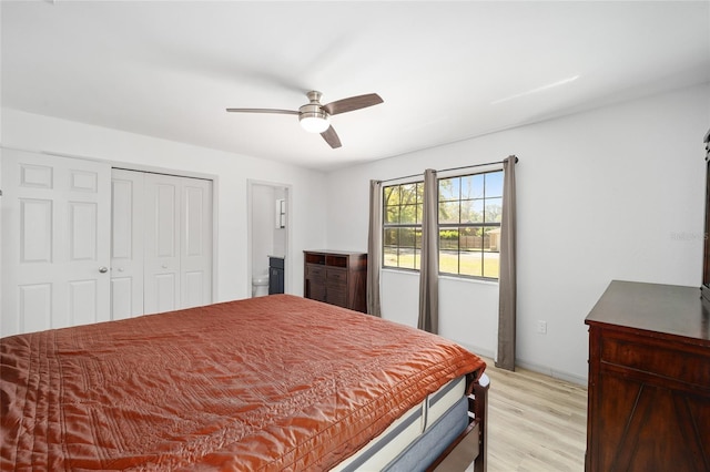 6549 NW 65th Pl, Ocala, FL 34482 - bedroom featuring baseboards, a closet, light wood finished floors, and ceiling fan