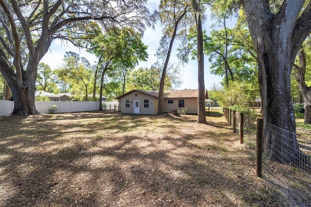 6549 NW 65th Pl, Ocala, FL 34482 - view of yard featuring a fenced backyard