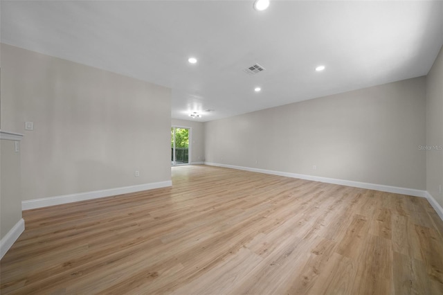 341 SE 53rd Ct, Ocala, FL 34480 - empty room with light wood-type flooring, recessed lighting, baseboards, and visible vents