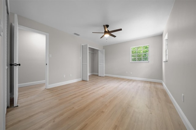 341 SE 53rd Ct, Ocala, FL 34480 - unfurnished bedroom featuring baseboards, light wood-style floors, and a ceiling fan
