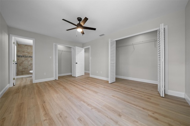 341 SE 53rd Ct, Ocala, FL 34480 - unfurnished bedroom with baseboards, light wood-style floors, multiple closets, and visible vents