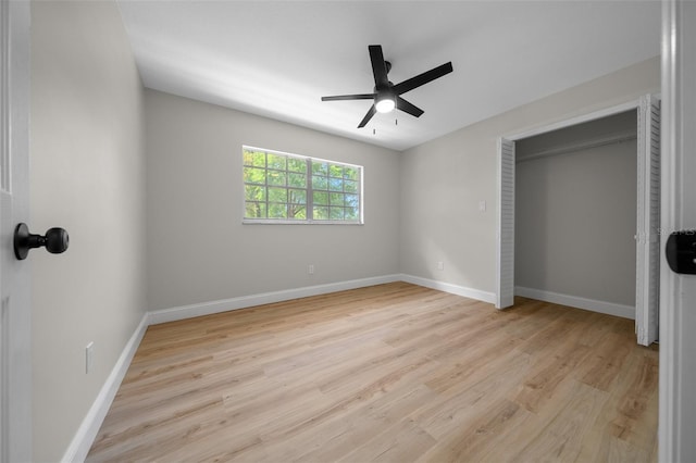 341 SE 53rd Ct, Ocala, FL 34480 - unfurnished bedroom featuring baseboards, a closet, a ceiling fan, and light wood finished floors