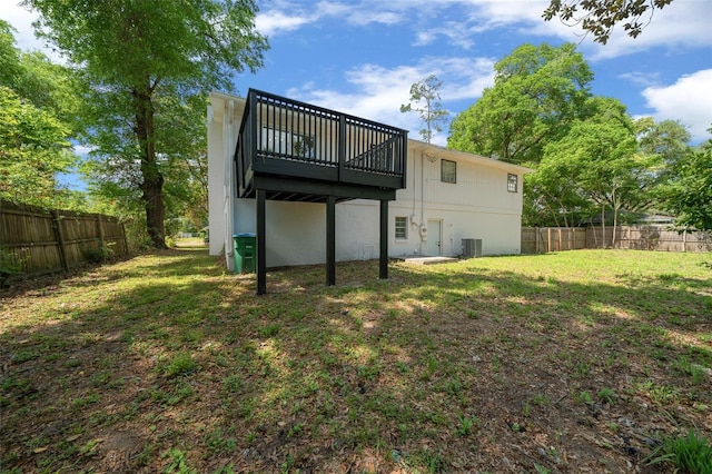 341 SE 53rd Ct, Ocala, FL 34480 - back of property with a fenced backyard, cooling unit, and a yard