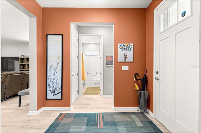 9342 SW 102nd Terrace Rd, Ocala, FL 34481 - foyer featuring baseboards and light wood-style flooring