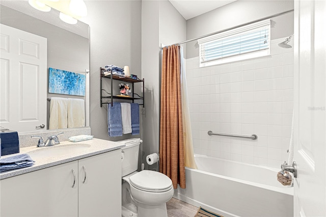 9342 SW 102nd Terrace Rd, Ocala, FL 34481 - bathroom featuring shower / tub combo with curtain, toilet, vanity, and wood finished floors