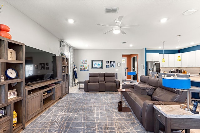 9342 SW 102nd Terrace Rd, Ocala, FL 34481 - living area with recessed lighting, dark carpet, ceiling fan, and visible vents