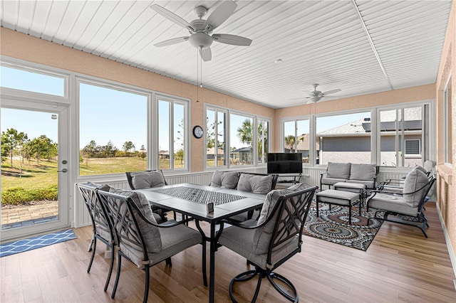 9342 SW 102nd Terrace Rd, Ocala, FL 34481 - sunroom / solarium featuring an outdoor living space, wood finished floors, outdoor dining space, and a ceiling fan
