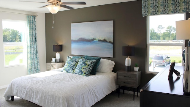 6585 SW 81st Loop, Ocala, FL 34476 - carpeted bedroom featuring baseboards and ceiling fan