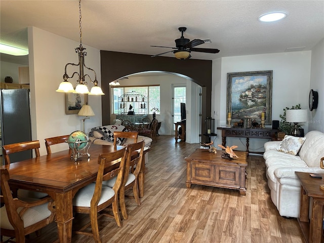 9053 SW 103rd Ave, Ocala, FL 34481 - dining area with arched walkways, ceiling fan, light wood-type flooring, and recessed lighting
