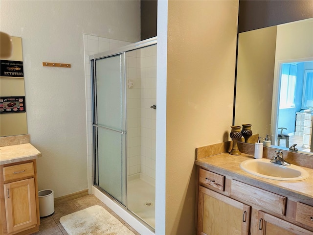 9053 SW 103rd Ave, Ocala, FL 34481 - bathroom with a shower stall, vanity, and tile patterned flooring