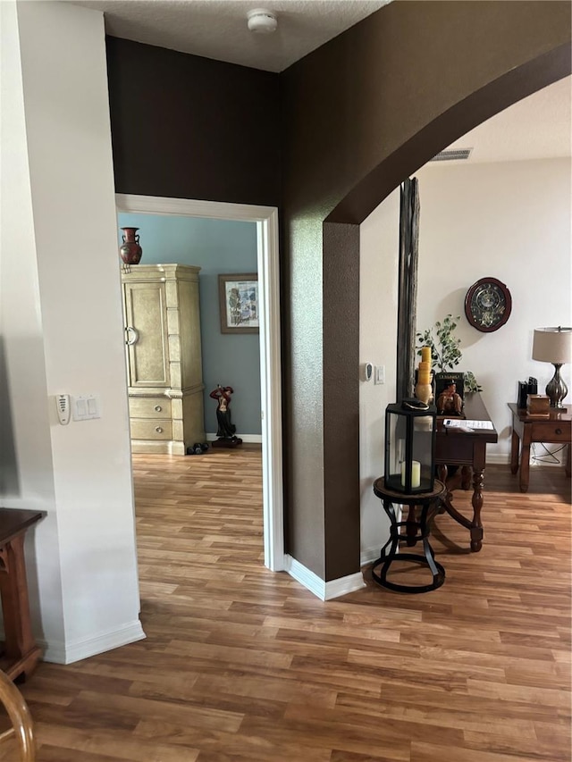9053 SW 103rd Ave, Ocala, FL 34481 - hall featuring wood finished floors and baseboards