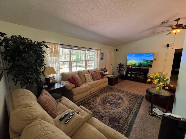 4540 W Sandy Hill St, Lecanto, FL 34461 - living room with carpet, vaulted ceiling, a ceiling fan, and a textured ceiling