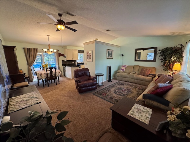 4540 W Sandy Hill St, Lecanto, FL 34461 - living area with a chandelier, a ceiling fan, carpet flooring, lofted ceiling, and a textured ceiling