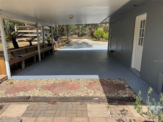 4540 W Sandy Hill St, Lecanto, FL 34461 - view of patio featuring a carport