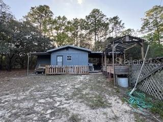 4540 W Sandy Hill St, Lecanto, FL 34461 - rear view of property featuring a deck