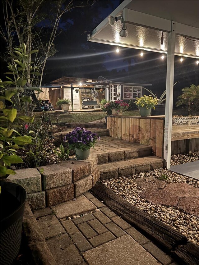 4540 W Sandy Hill St, Lecanto, FL 34461 - view of patio at twilight