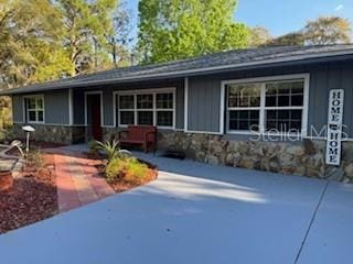 4540 W Sandy Hill St, Lecanto, FL 34461 - single story home with stone siding