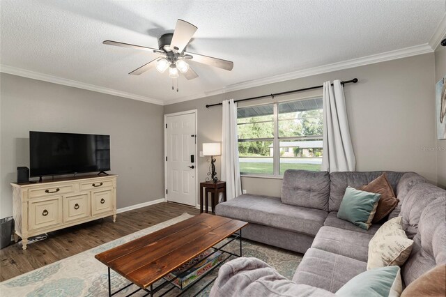 6830 NW 62nd Pl, Ocala, FL 34482 - living room featuring ornamental molding, a textured ceiling, ceiling fan, and dark wood finished floors