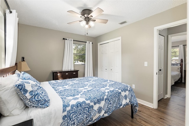6830 NW 62nd Pl, Ocala, FL 34482 - bedroom with multiple windows, visible vents, a closet, and wood finished floors