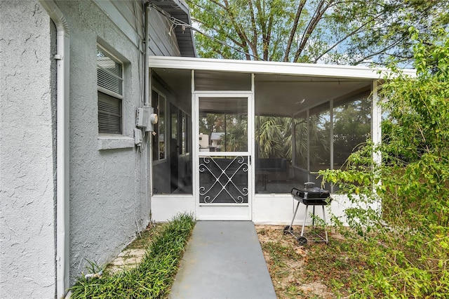 6830 NW 62nd Pl, Ocala, FL 34482 - doorway to property featuring stucco siding