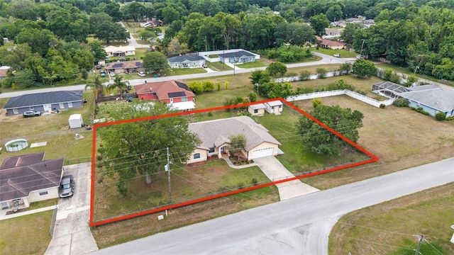 aerial view of residential area with property parcel outlined