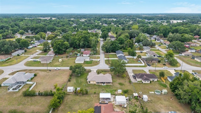 aerial view of property's location with nearby suburban area