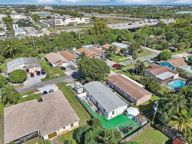 birds eye view of property with a residential view