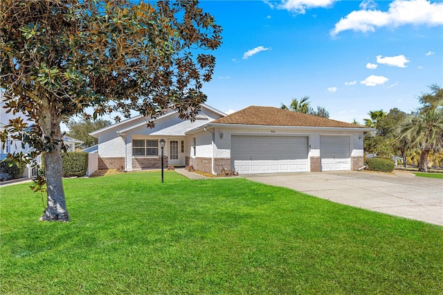 view of front of home featuring driveway, brick siding, a garage, and a front lawn