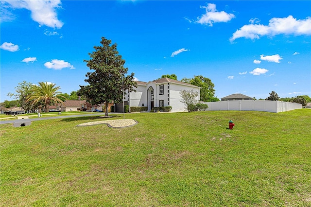 view of yard featuring fence