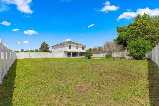 view of yard featuring a fenced backyard