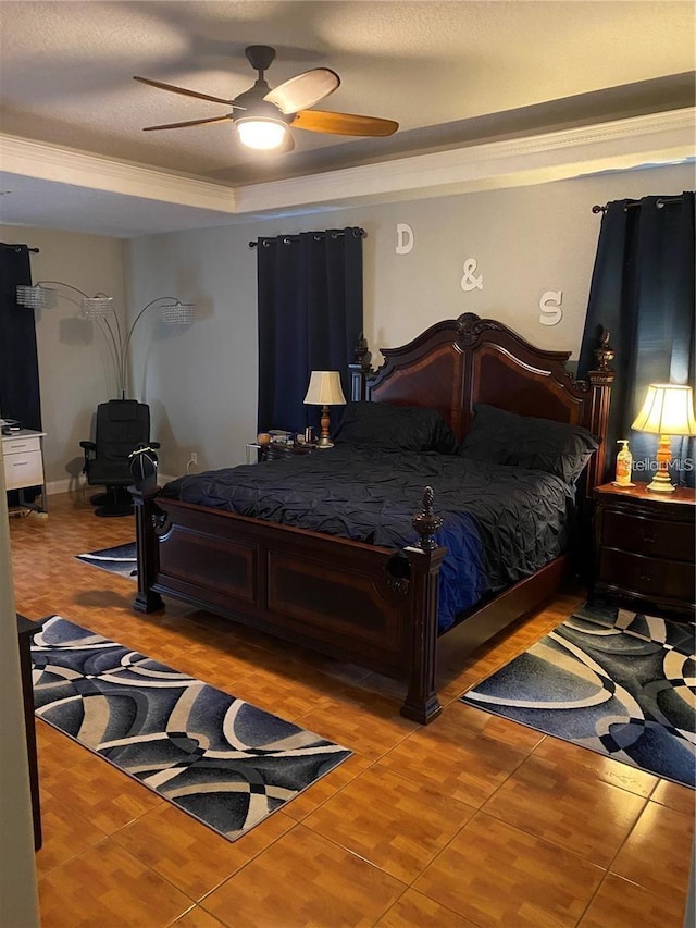5323 SW 111th Lane Rd, Ocala, FL 34476 - tiled bedroom featuring a raised ceiling and a ceiling fan