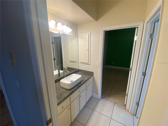 5323 SW 111th Lane Rd, Ocala, FL 34476 - bathroom with vanity, tile patterned flooring, and baseboards