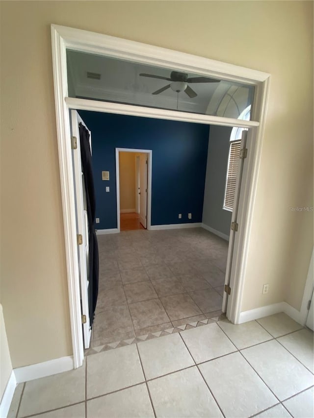 5323 SW 111th Lane Rd, Ocala, FL 34476 - corridor featuring light tile patterned flooring and baseboards